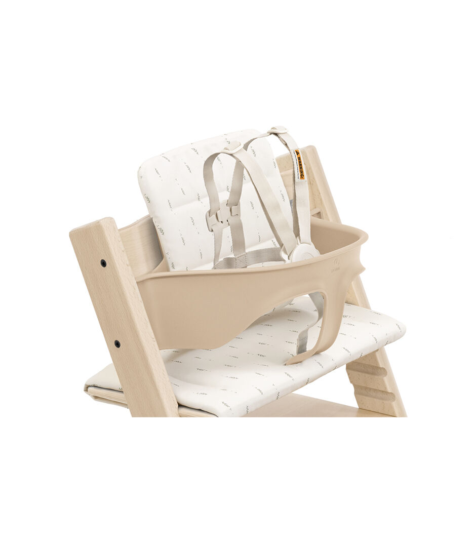Tripp Trapp® High Chair Natural with Cushion-25 Wheat Cream. US variant with Stokke® Harness. Close-up.