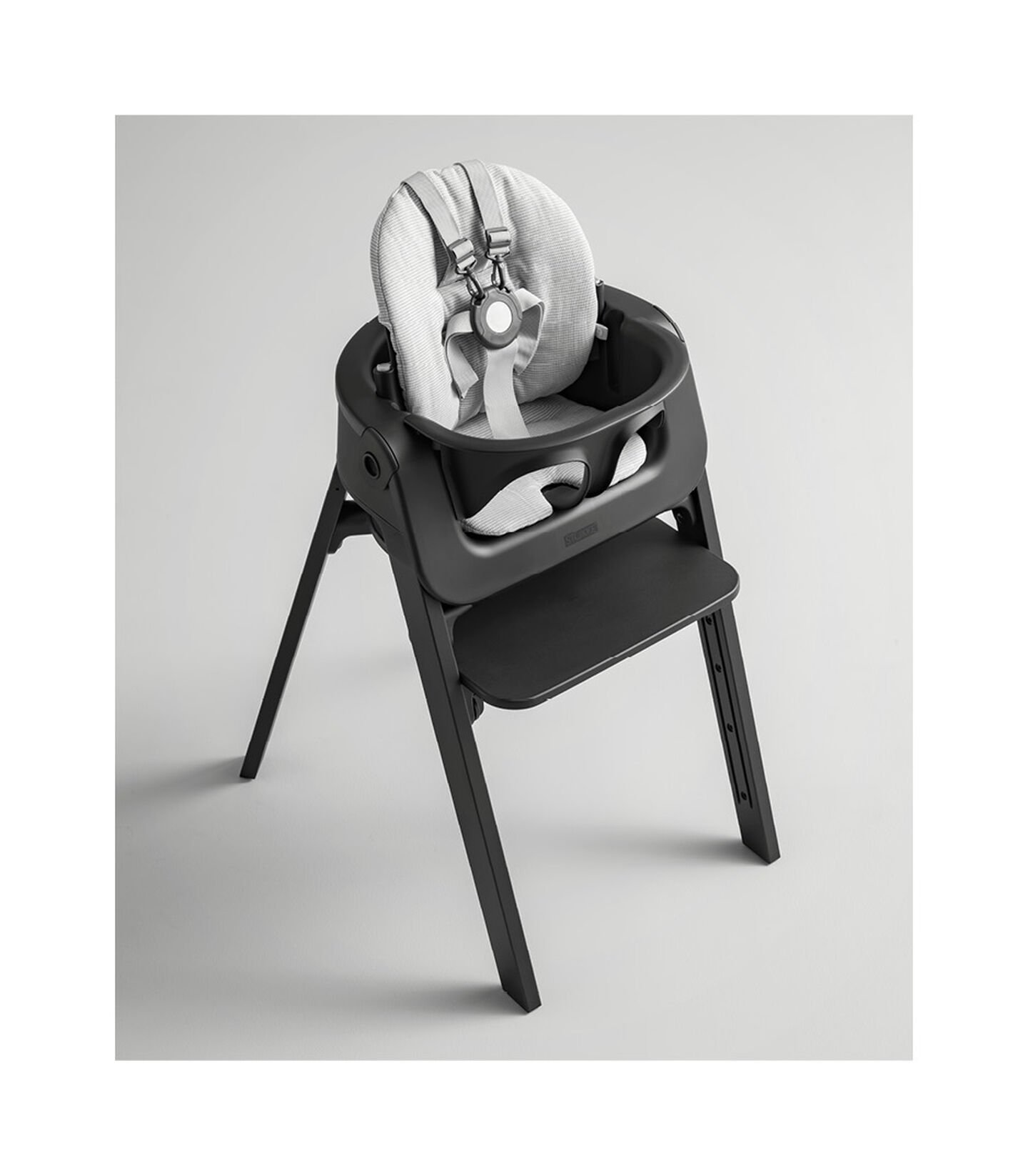 Stokke® Steps™ High Chair Black Beech with Black Baby Set and Nordic Grey Cushion view 2
