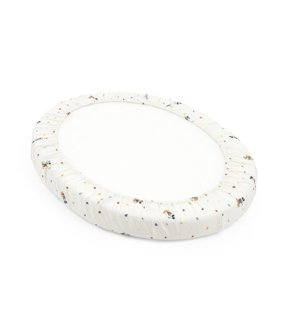 Stokke® Sleepi® Mini Mattress. Fitted Sheet, Disney Mickey Celebration. Detail, bottom side. Limited Edition.