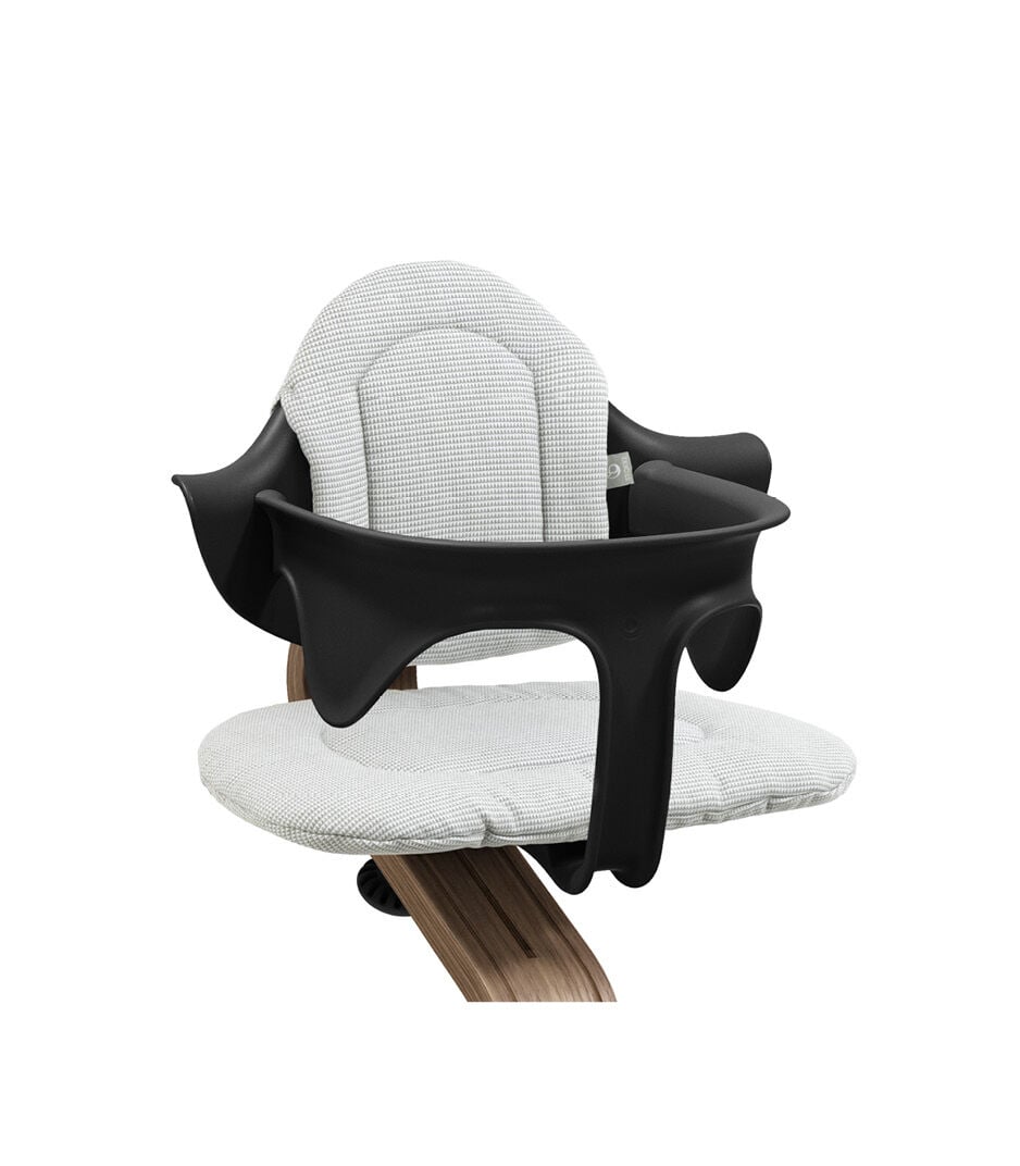 Stokke® Nomi® Chair. Premium Walnut wood and Black plastic parts. Baby Set. Cushion Nordic Grey. Close-up. galery image 3