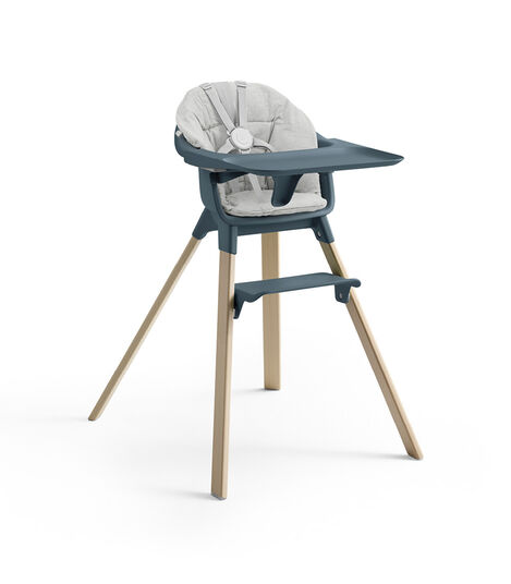 Stokke® Clikk™ High Chair with Tray and Harness, in Natural and Fjord Blue. Cushion Nordic Grey. view 8