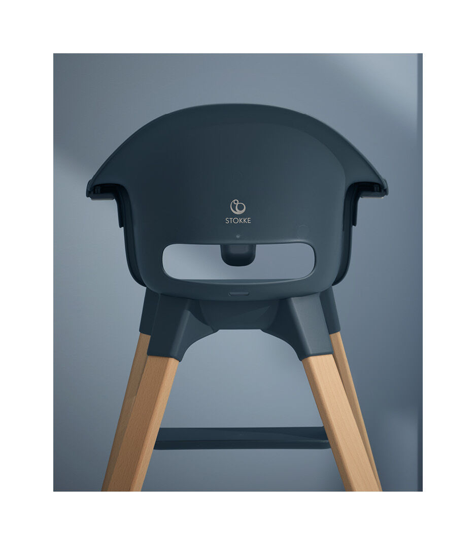 Stokke® Clikk™ High Chair. Fjord Blue with Natural Beech legs. Styled.