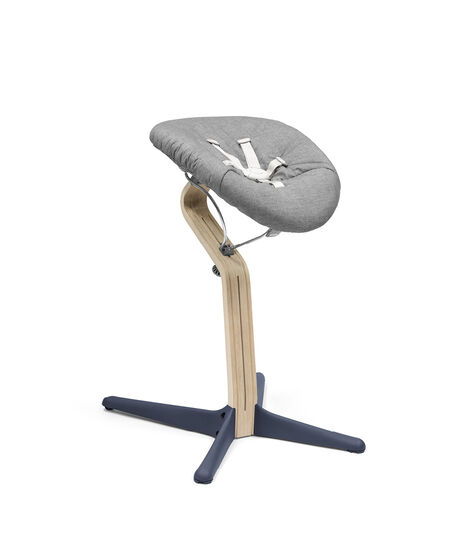 Stokke® Nomi® Chair Natural-Navy with Newborn Set Grey. view 3