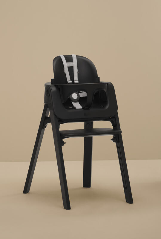 Mother feeding baby on Steps Chair