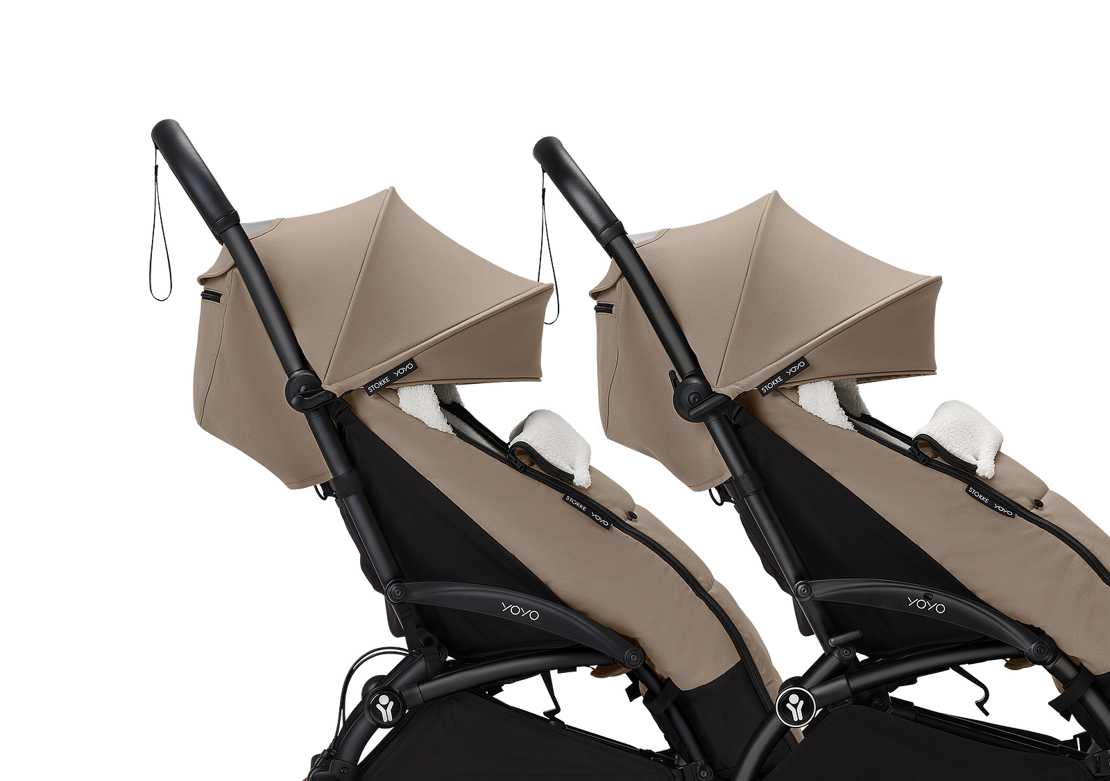 Two beige YOYO strollers with black frames and white faux fur lining.