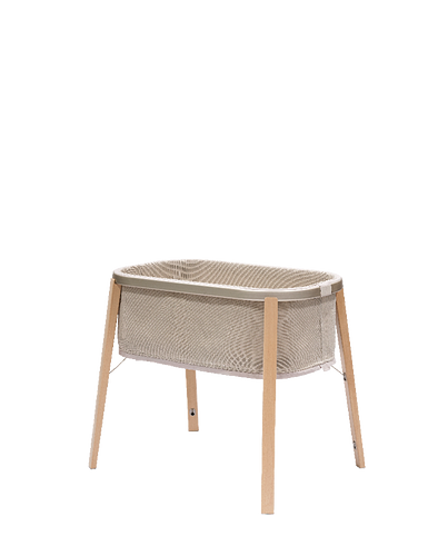 Snoozi bassinet in color sandy beige.