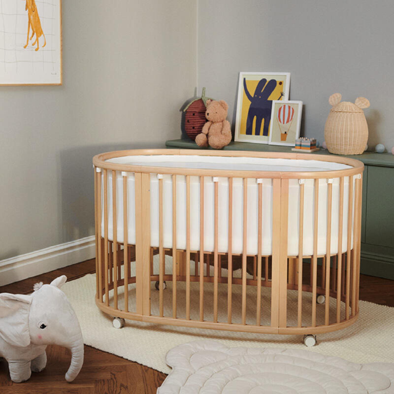 Sleepi crib bed with liner in nursery. An essential piece of nursery furniture.