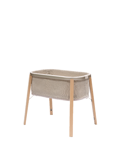 Snoozi bassinet in color sandy beige.