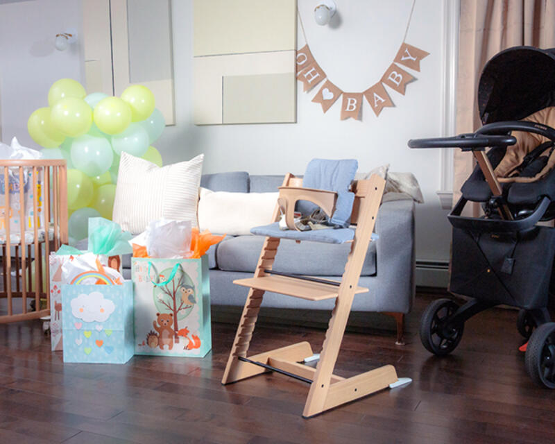 Tripp Trapp® chair being gifted at a baby shower party.