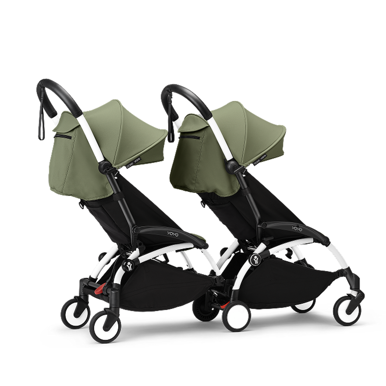 Two green and black STOKKE YOYO strollers connected as a double stroller.