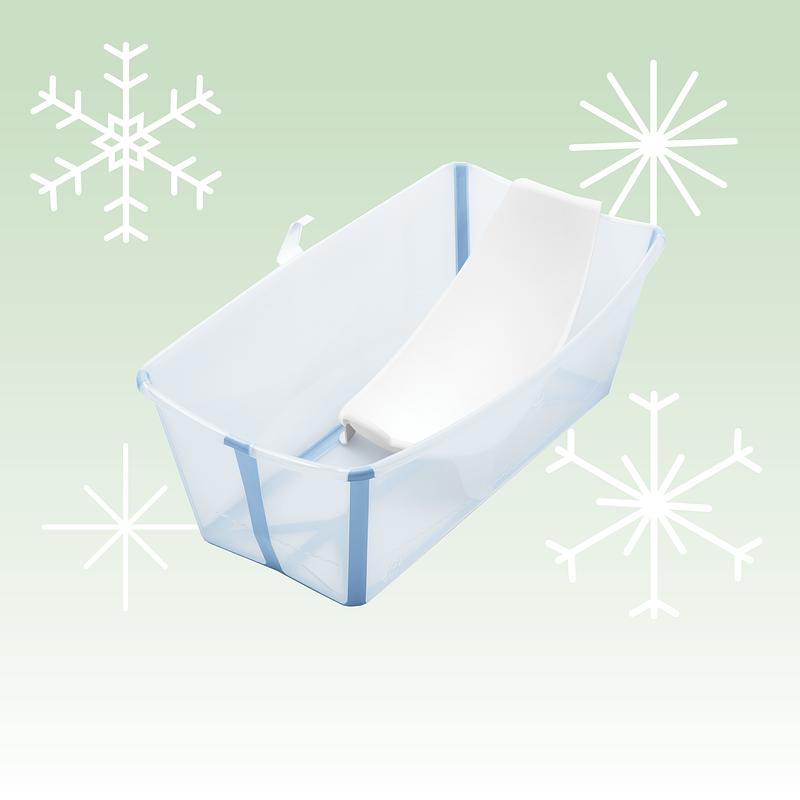 Flexi bath for newborn with holiday background.