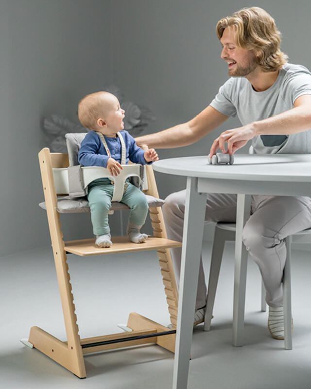 Father and baby in the Tripp Trapp chair