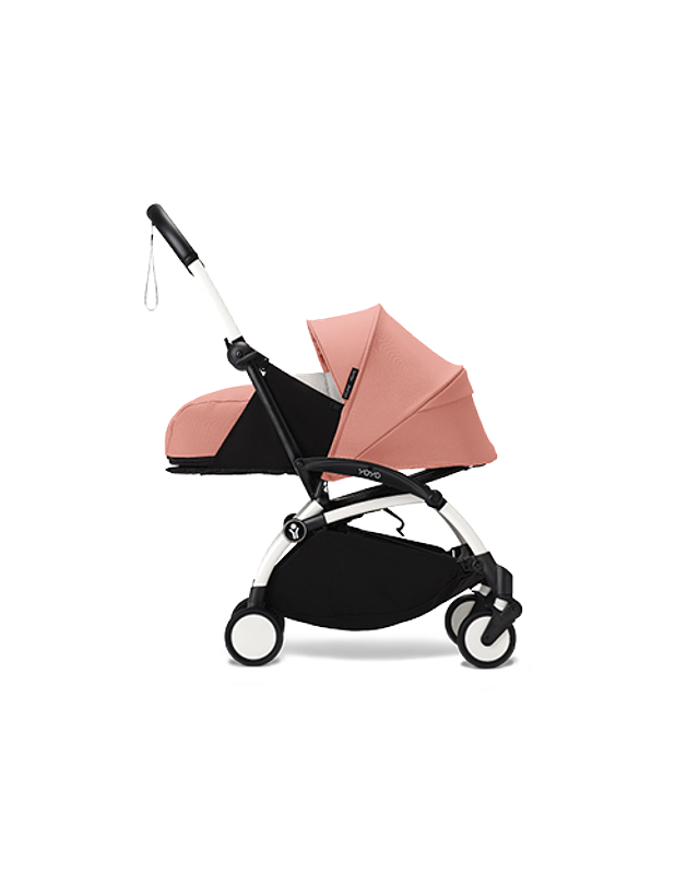 Ginger YOYO newborn stroller with white frame.