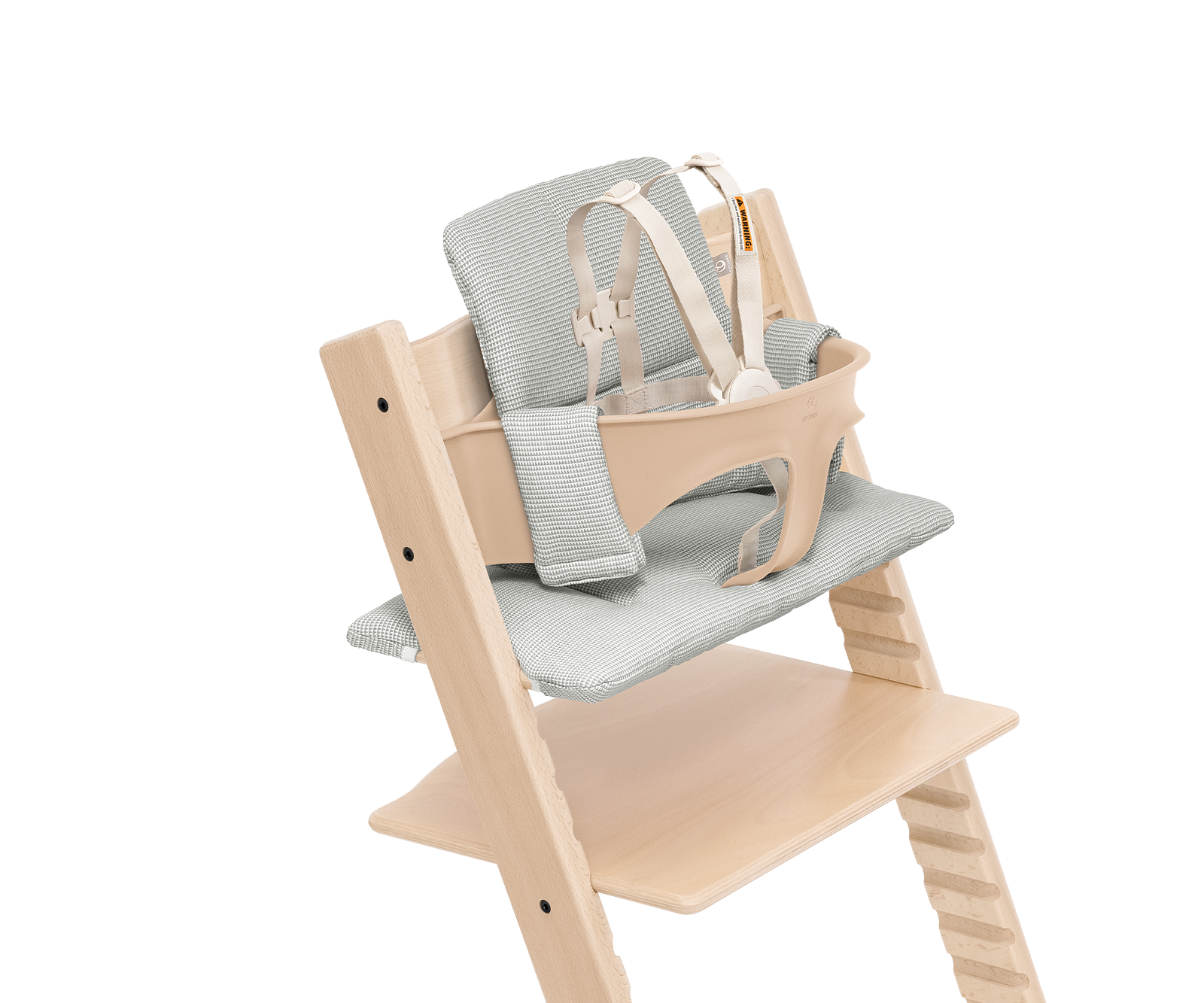 Tripp Trapp high chair with beige Baby Set, grey cushions, and harness on white background.