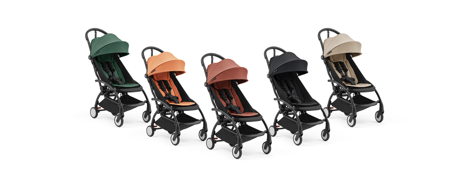 Fem STOKKE YOYO barnvagnar i gröna, orange, terrakotta, svarta och beiga färger.