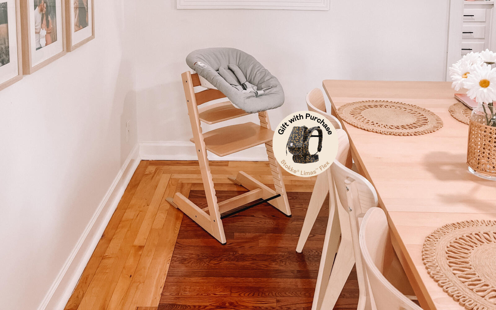Tripp Trapp chair in color natural with grey newborn set attached and a limas gift with purchase callout.