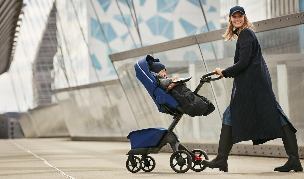 lady walking with xplory x stroller