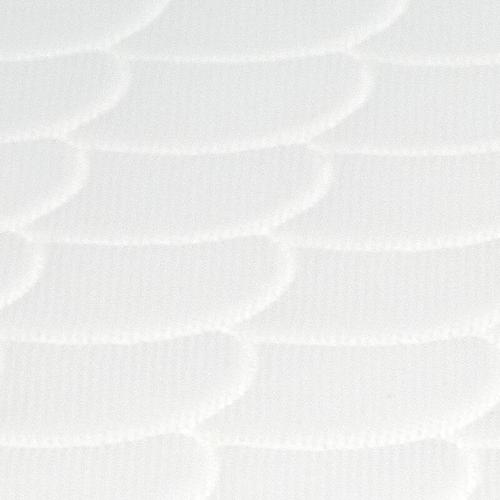 White sleepi mini mattress closeup scallop pattern.