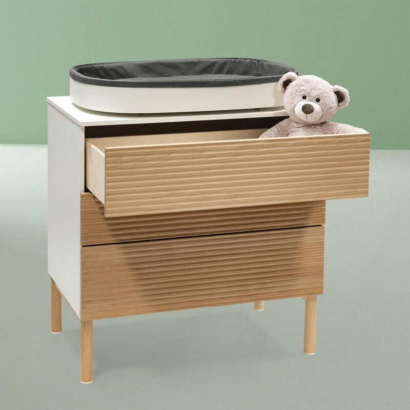 Sleepi dresser in color natural with baby changer on top.