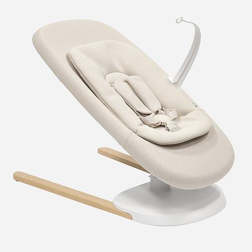 Yoga baby bouncer comes with a toy bar so a child can play.