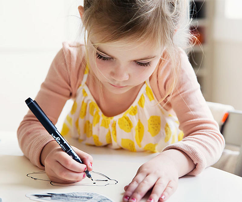 A girl drawing a picture