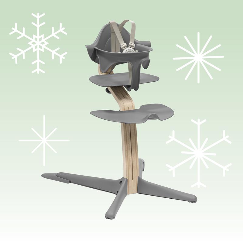 Nomi high chair with holiday background.