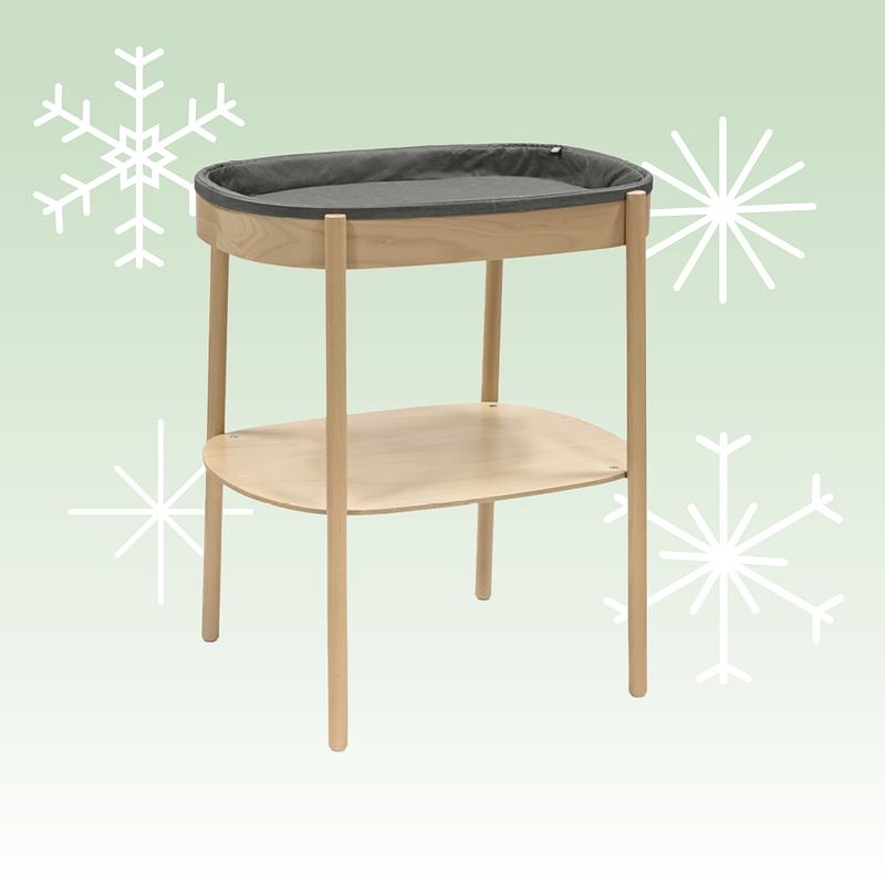 Sleepi changing table with holiday background.