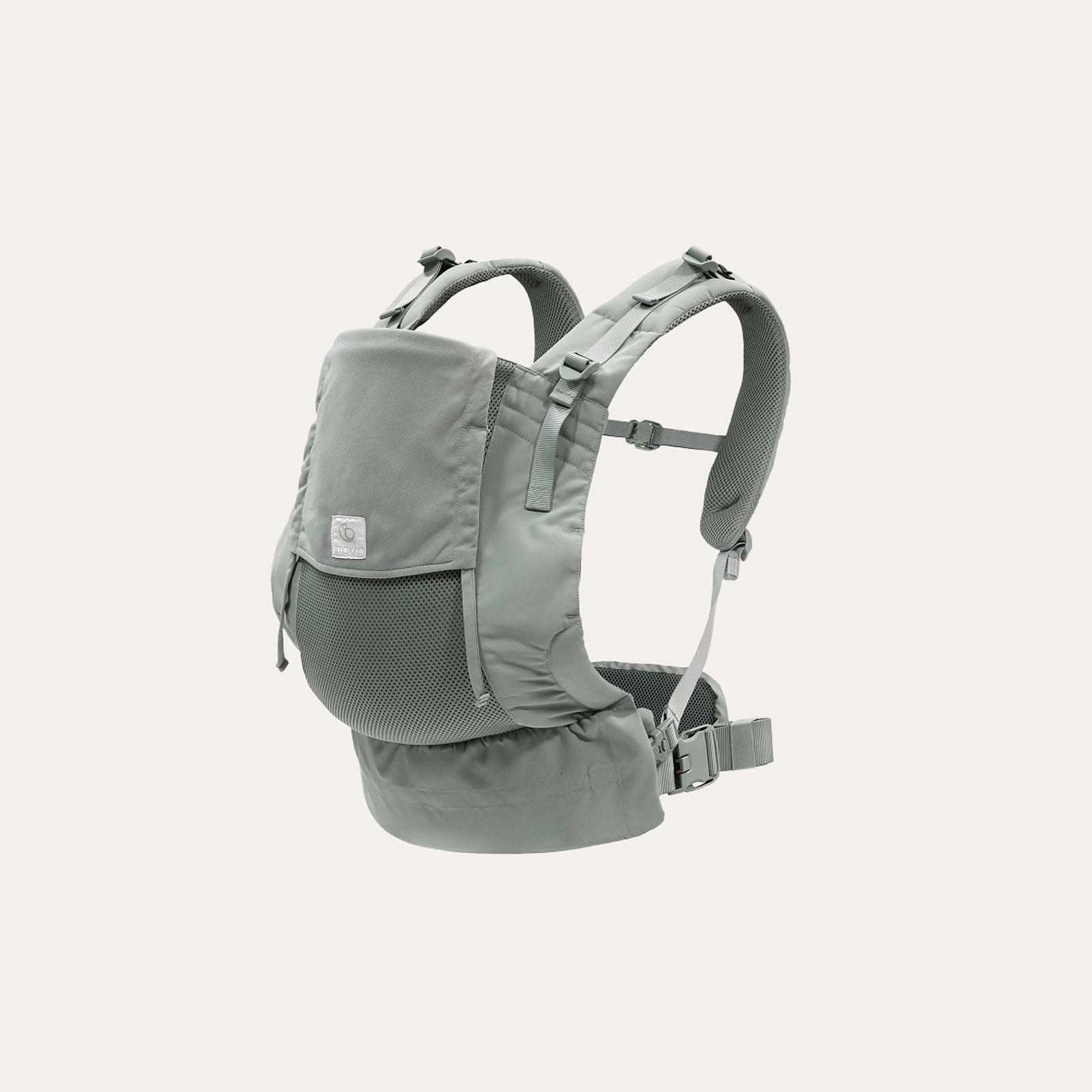 Stokke MyCarrier in light grey, featuring mesh and padded straps.