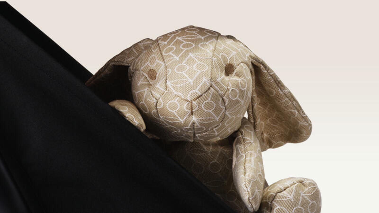 YOYO x Bonpoint baby gear collaboration iconic print bunny stuffed animal.