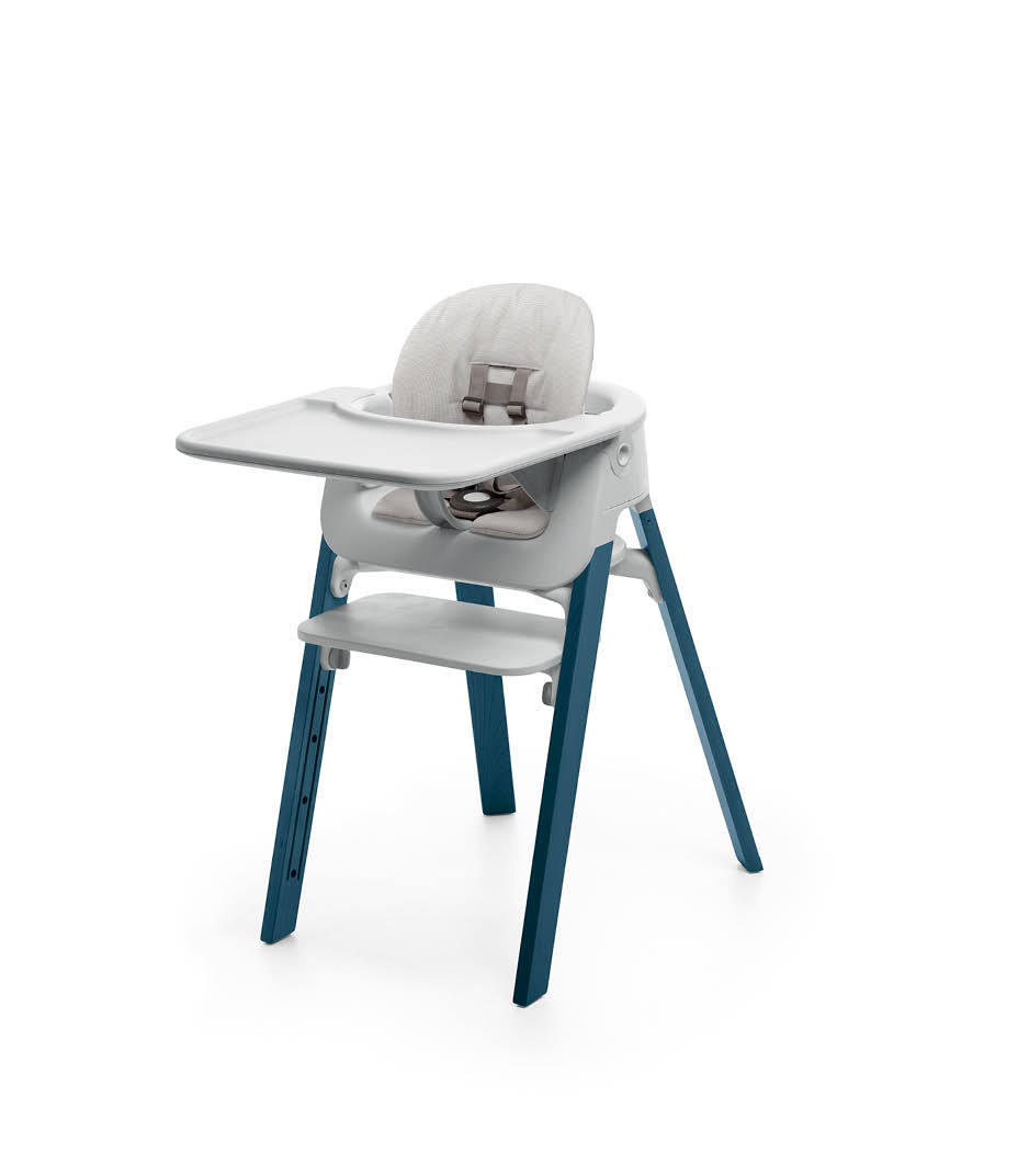 Stokke&reg; Steps&trade; Midnight Blue with Accessories. Baby Set Light Grey. Baby Set Cushion Timeless Grey. Baby Set Tray Light Grey.